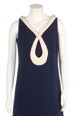 Lot 200 - A Pierre Cardin navy wool crêpe maxi-dress,...