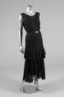 Lot 224 - A black chiffon and lace evening gown circa...