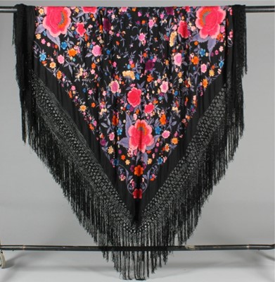 Lot 233 - An embroidered black silk shawl, Chinese,...