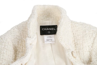 Lot 37 - A Chanel white cotton-tweed suit,...