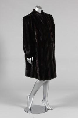 Lot 319 - A striped dark brown mink coat, 1980s, lightly...