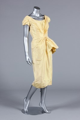 Lot 81 - A Ceil Chapman primrose yellow taffeta...