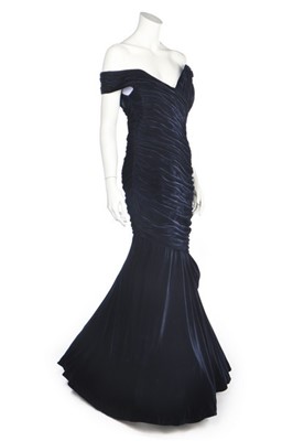 Lot 237 - Princess Diana's Victor Edelstein midnight-blue velvet evening gown