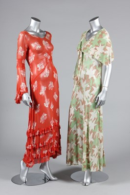 Lot 366 - Two floral printed chiffon evening gowns,...