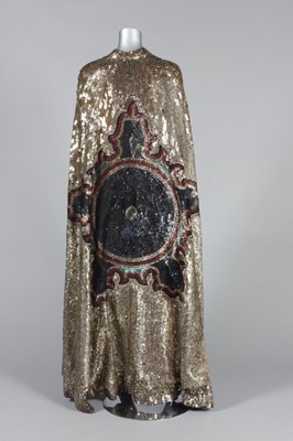 Lot 371 - A spectacular sequined cape, 1930s, the red...