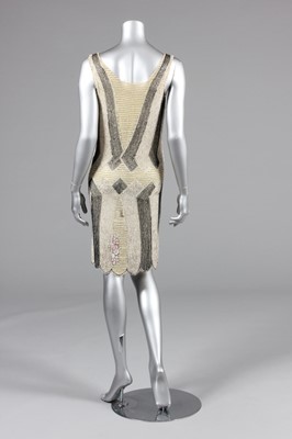 Lot 24 - A beaded tunic-dress, late 1920s, of...