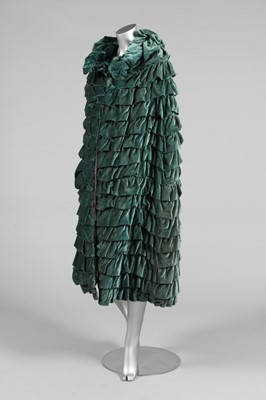 Lot 373 - Two velvet evening capes, 1930s, the...