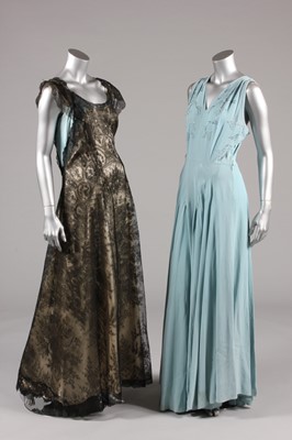 Lot 376 - A pale blue crepe romain evening gown circa...