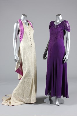 Lot 377 - An ivory cloque evening gown, circa 1940, with...