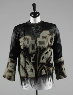 Lot 380 - An interesting embroidered black satin evening...