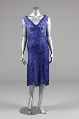 Lot 23 - A sapphire-blue beaded chiffon flapper dress,...