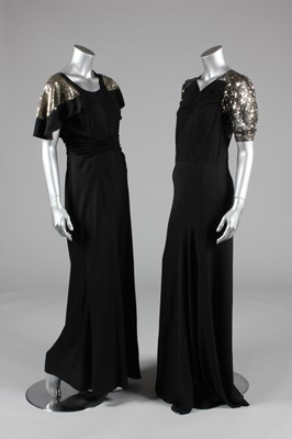 Lot 383 - Two evening gowns, late 1930s, one of black...