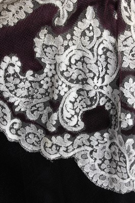 Lot 387 - A black and white lace ball gown with matching...