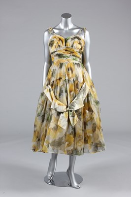 Lot 388 - Three pretty floral cocktail dresses, late 50s-...