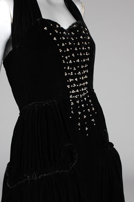 Lot 395 - A Harvey Nichols black velvet and rouleau...