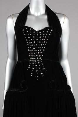 Lot 395 - A Harvey Nichols black velvet and rouleau...