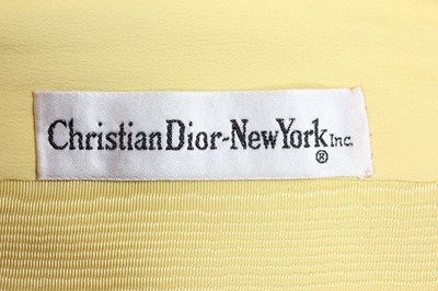 Lot 411 - A Christian Dior New York yellow moire...