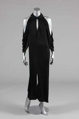 Lot 445 - A Yuki black draped jersey evening gown, late...