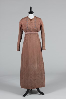 Lot 452 - An A. Groult brown damask day dress, circa...