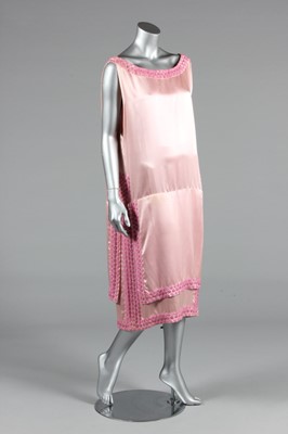 Lot 239 - A rare Jenny couture pink satin beaded flapper...