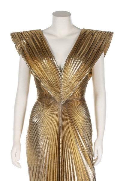 Lot 218 - A Loris Azzaro pleated gold lamé dress,