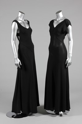 Lot 280 - Two black crepe bias cut couture evening gowns,...